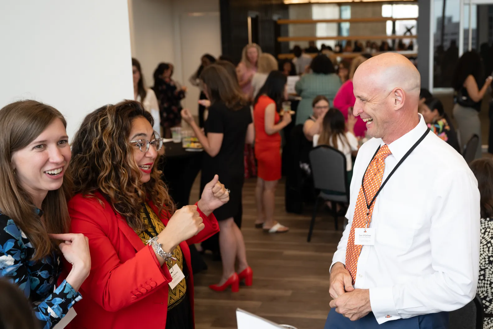 Elizabeth Martinez (center) celebrates her recent win as District Judge (D-73, San Antonio), with Amy Kroll (left) and LBJ School of Public Affairs Dean JR DeShazo (right).