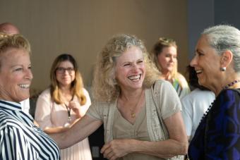 Leaders at the LBJ Women's Campaign School confer after a mentor session